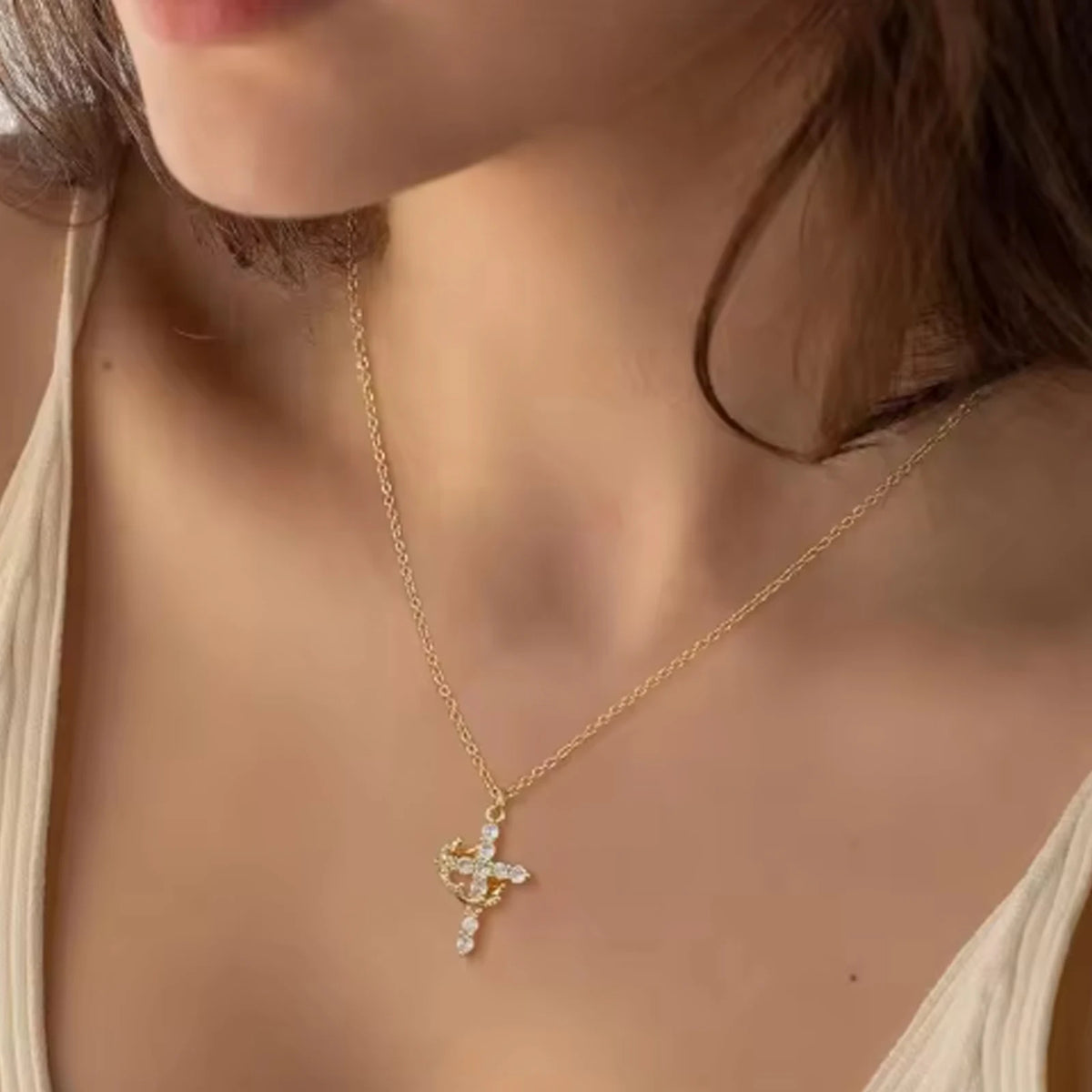 Rotating Crown Cross Necklace